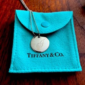 Tiffany and Co. J necklace. Sterling silver. Never worn. Box and card.
